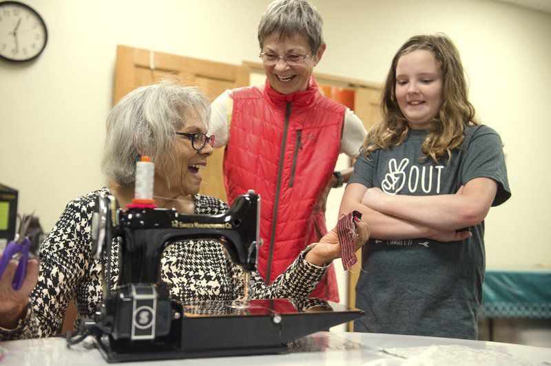 As demand for protective equipment grows, volunteers step up to make masks